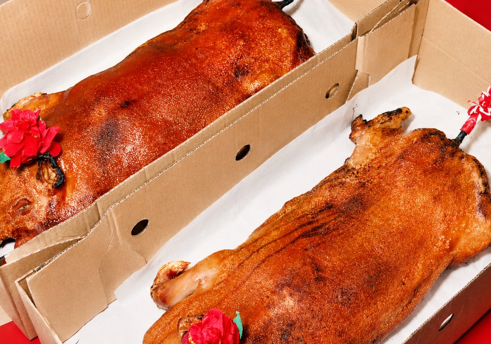 Guan Chee roasted suckling pigs, boxed for collection